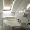 Svájci Lak Panzió fürdőszobája Nyíregyházán